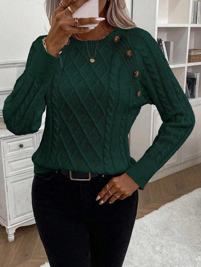 Clara | Trui met knoopdetails en kabelbreisel