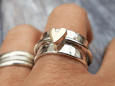 Mely - Zilveren ring met gouden hart